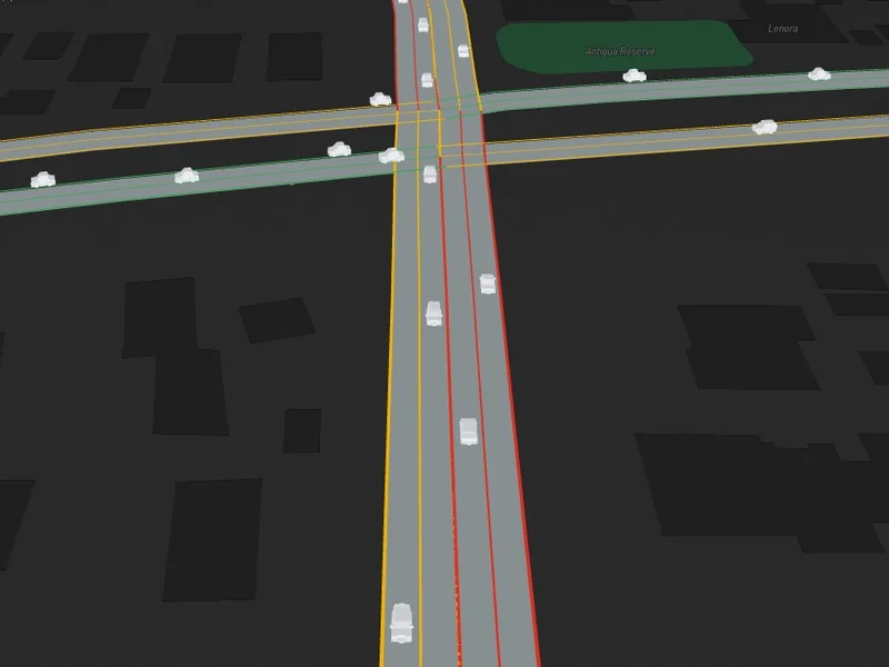 Close-up of the 3D simulation: vehicles moving through a junction